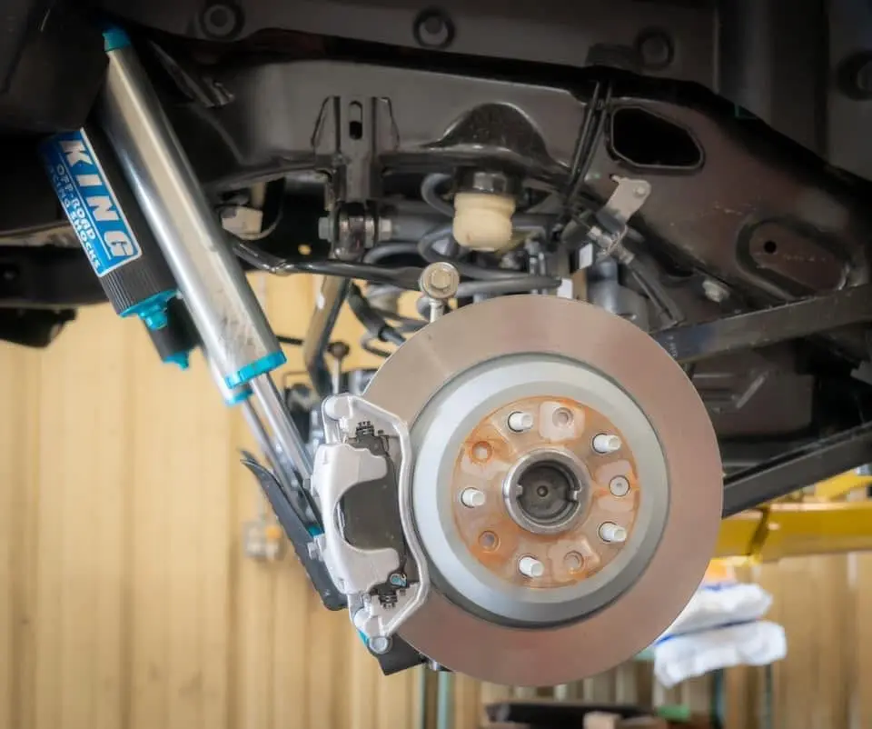 Shock absorber and brake assembly on a lifted vehicle at iShop
